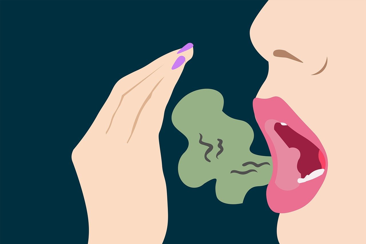 A cartoon rendering of a green cloud of bad breath coming from a woman's mouth. 