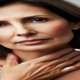 An image of a woman with throat phlegm rubbing her neck in discomfort.