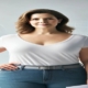 An image of a woman happy with her weight loss with Qsymia.