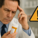 Contrave and Suboxone drug interactions symbolized by a pharmacist's frown as he reads a pill label.