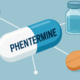Phentermine drug interactions symbolized by a cartoon rendering of a phentermine capsule with arrows pointing to other pills and a vial of medication.